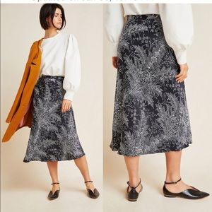 Anthropologie black print satin bias skirt